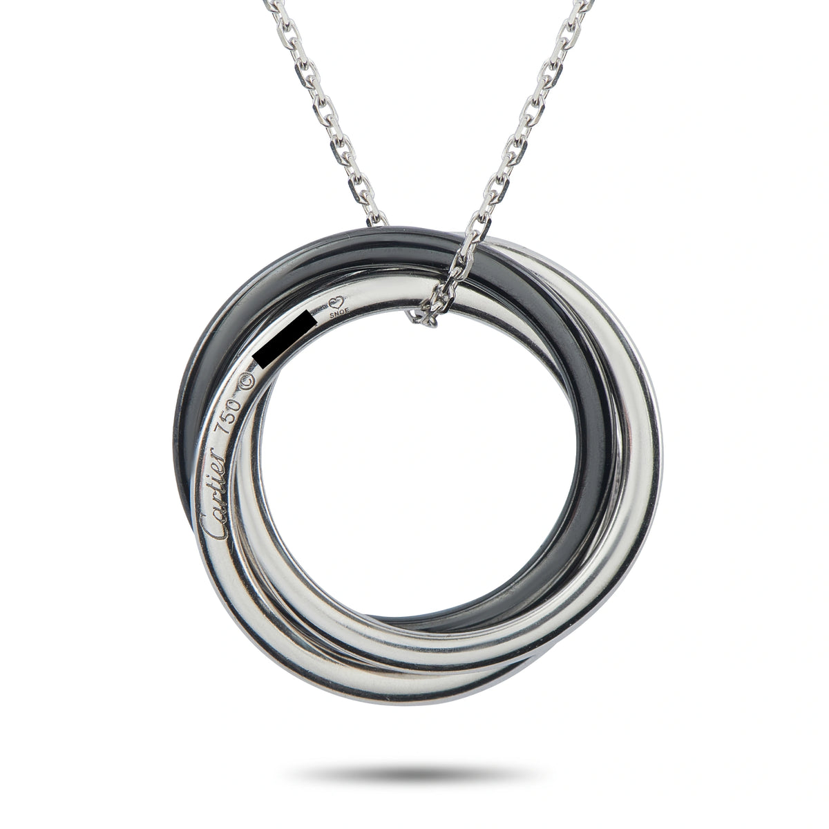 Circular white gold and black ceramic pendant with engraved inner band