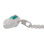 Cartier vintage eagle head 18K white gold pendant with diamonds, emerald, and turquoise