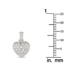 Heart diamond pendant in 18K white gold next to size scale (mm)