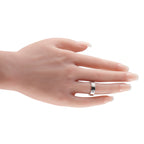 Cartier 18K white gold ring with diamond bezel, worn on hand