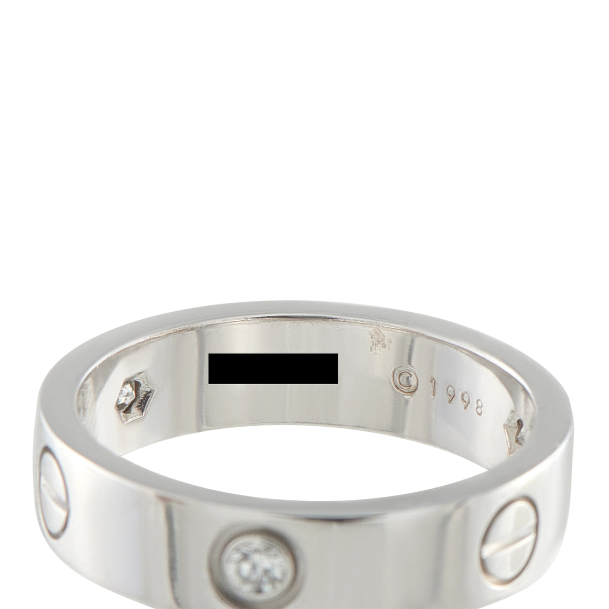 18K white gold ring band with three round diamond settings and inner hallmark