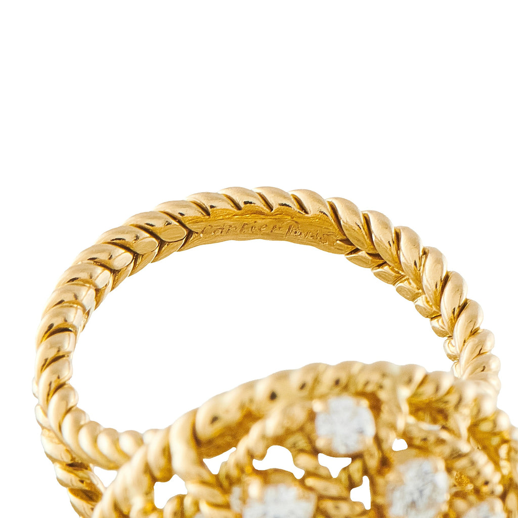 Cartier vintage yellow gold ring with twisted band and diamond dome