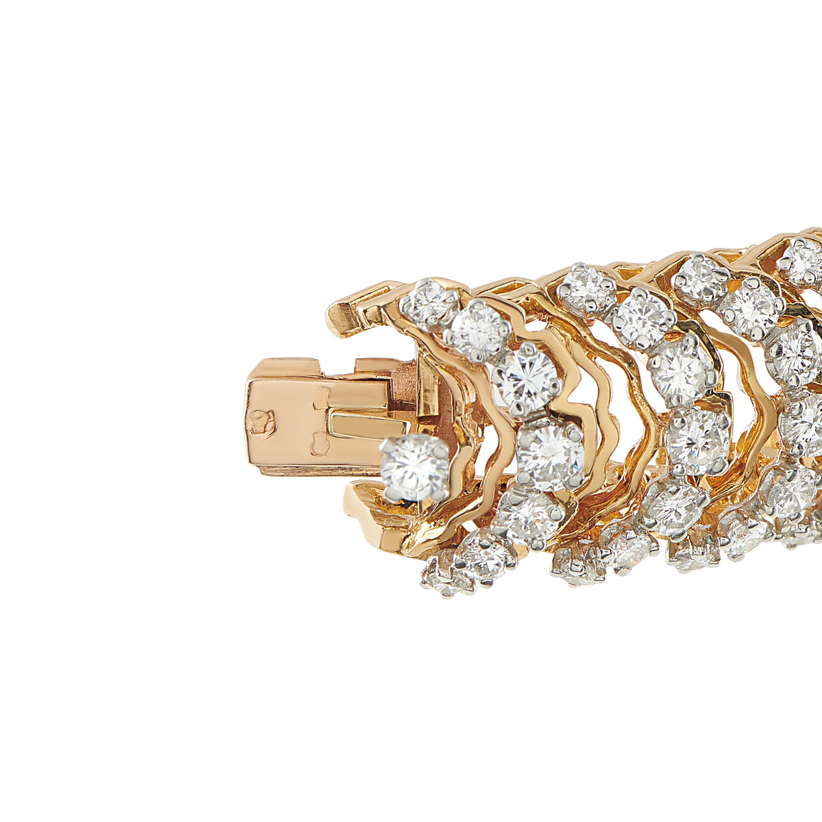 Close-up of the Cartier bracelet's gold clasp and diamond-set links
