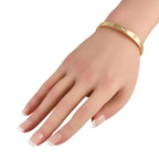 Cartier Love gold diamond bracelet worn on the wrist