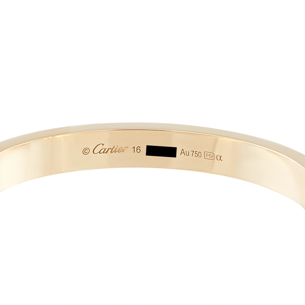 Cartier Love bracelet interior showing Cartier engraving and 18K gold hallmark