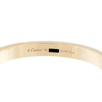 Cartier Love bracelet interior showing Cartier engraving and 18K gold hallmark