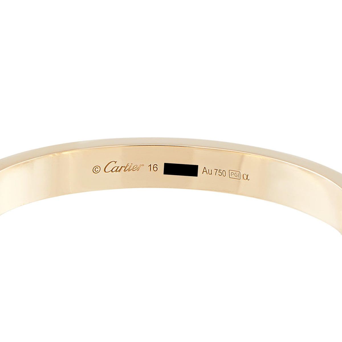 Cartier Love bracelet interior showing Cartier engraving and 18K gold hallmark