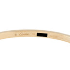 Inside of the gold bracelet engraved Cartier and Au 750