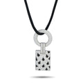 White gold diamond and onyx pendant on black cord, square motif and circular bail