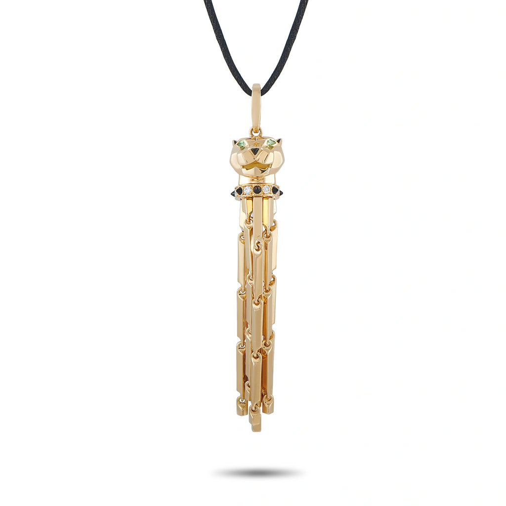 Cartier 18K yellow gold panther pendant necklace with diamonds, onyx, and tsavorite accents