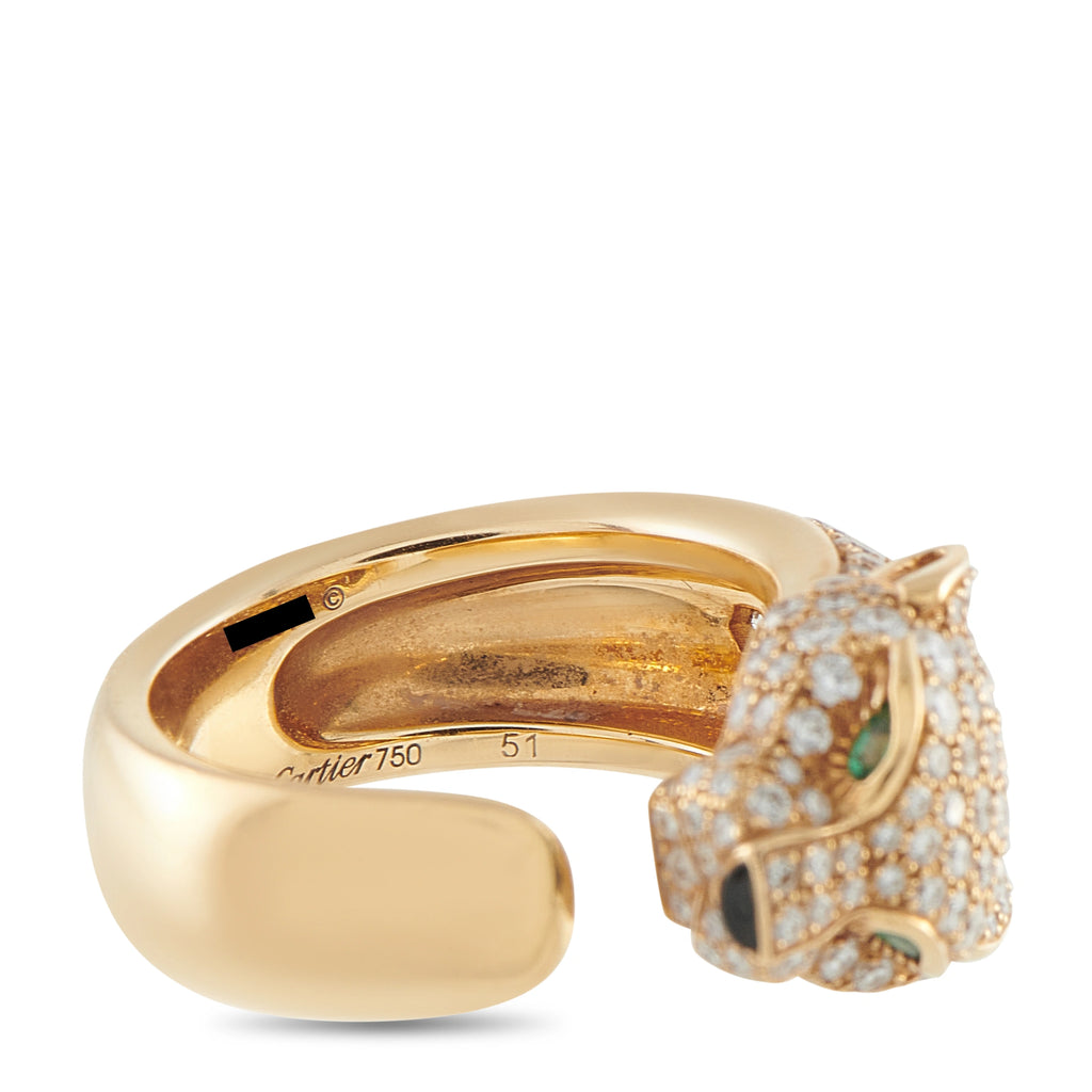 Cartier Panthère 18K yellow gold ring with diamond panther head, emerald eyes, and onyx nose