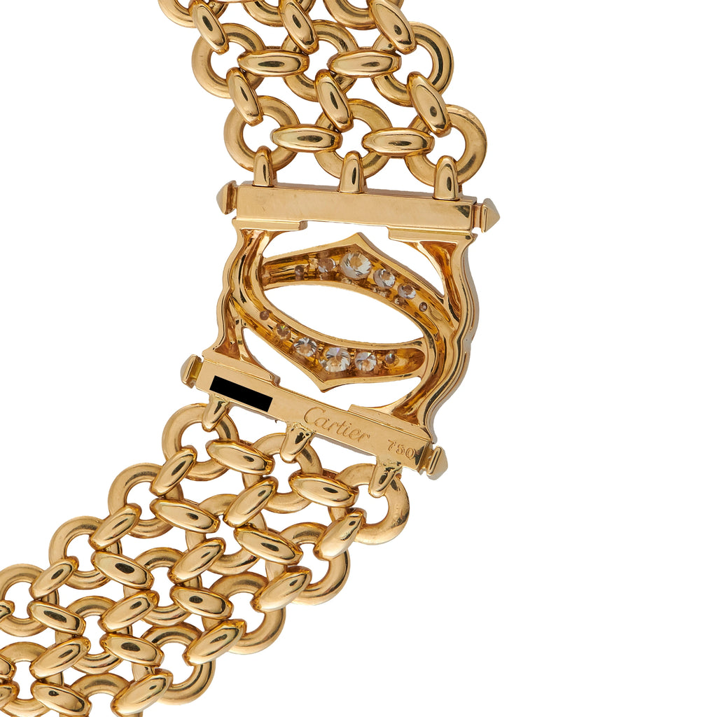 18K yellow gold diamond necklace close-up of linked chain and oval diamond pendant