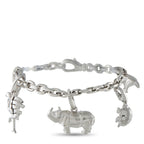 Cartier animal charm bracelet with linked chain and elephant and dog charms, silver tone