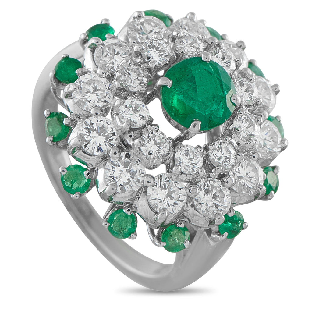 Cartier platinum diamond-and-emerald cluster ring with large green oval center stone