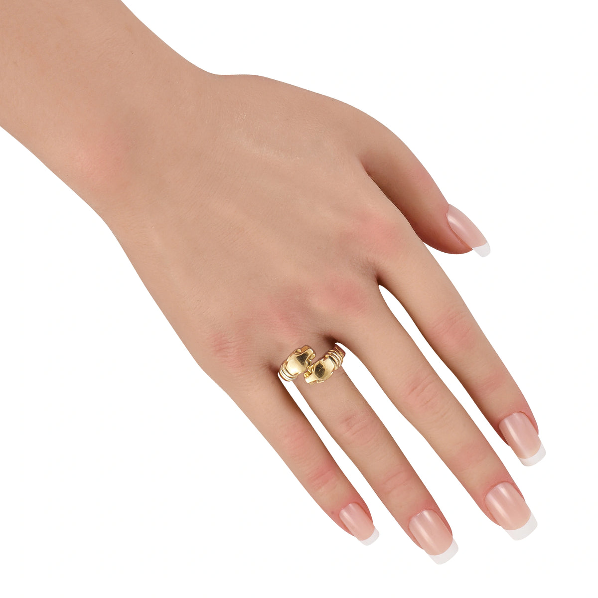 Cartier panther 18K gold ring on hand, square head with dark inset