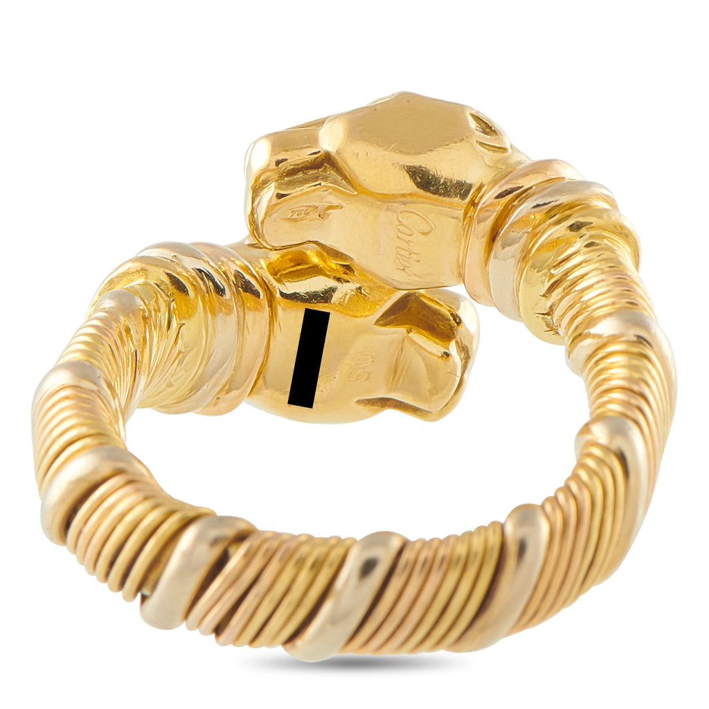 Cartier panther 18K gold ring detail, ribbed band and head bezel with dark center