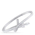 White gold diamond tennis bracelet with bow motif and marquise accents, hinged open