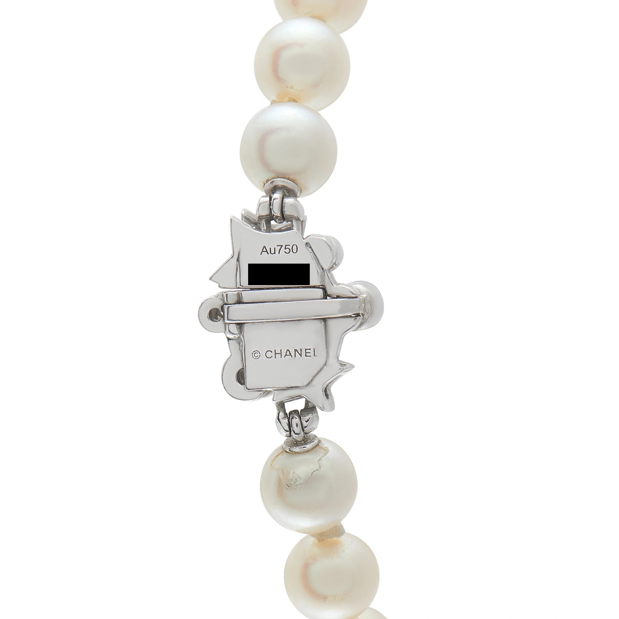 White pearl drop earrings with Chanel logo charm marked Au750 and metal details