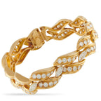 ChaumetVintage 18K Yellow Gold 9.67ct Diamond Wave Link Bracelet Here is a vintage Chaumet bracelet that provides a rich and comfortable drape on the wrist. It is designed to make a statemen