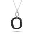 Onyx and diamond pendant necklace in white gold with oval black centerpiece.