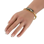 David Webb18K Yellow Gold Diamond and Black Enamel Skip Bracelet