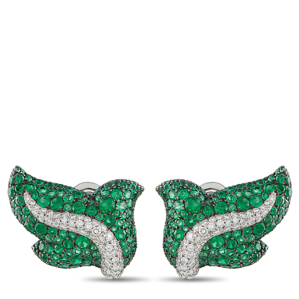 Pair of emerald green and white diamond crossover stud earrings, curved ribbon design