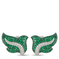Pair of emerald green and white diamond crossover stud earrings, curved ribbon design