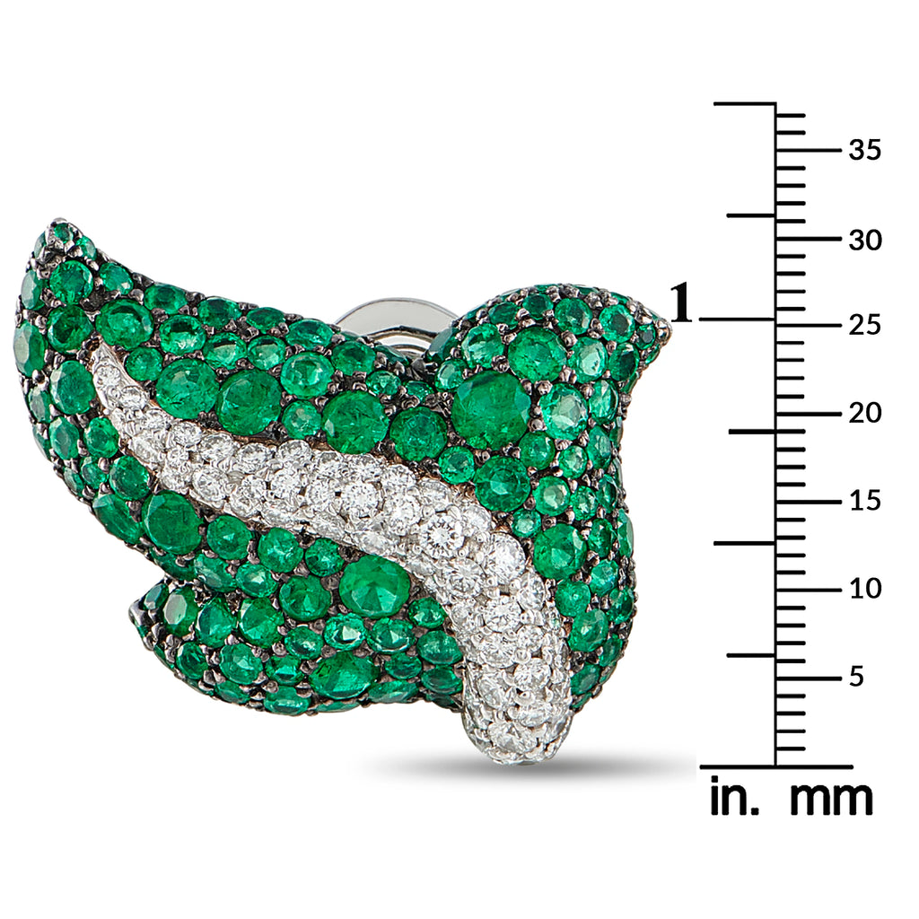 Emerald green and white diamond ribbon earrings shown with size ruler, white gold