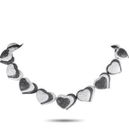 de Grisogono18K White Gold 57.56ct Diamond Black and White Hearts Necklace – Here is a daring creation of Swiss luxury jewele