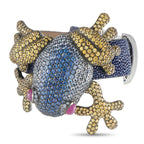 Rhinestone frog bracelet with blue sapphire-like stones and gold-toned detailing
