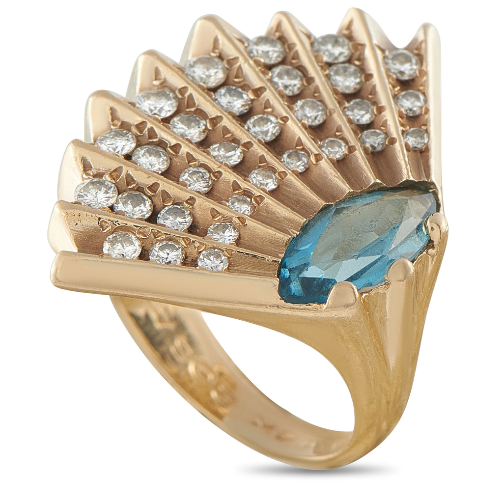 14K yellow gold cocktail ring with blue topaz and diamond row prongs