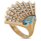 14K yellow gold cocktail ring with blue topaz and diamond row prongs