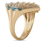 14K yellow gold topaz cocktail ring with blue center stone and diamond accents