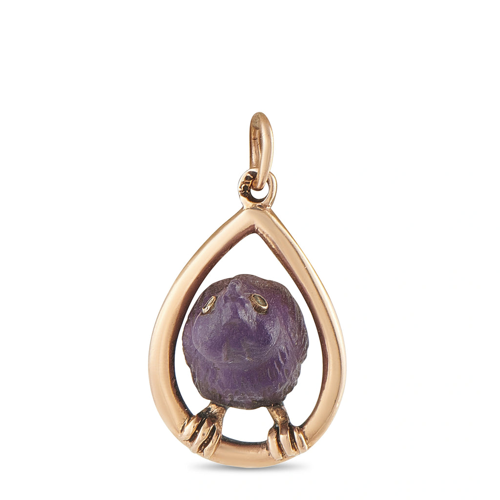 Rose gold teardrop pendant with carved purple amethyst bird cabochon setting