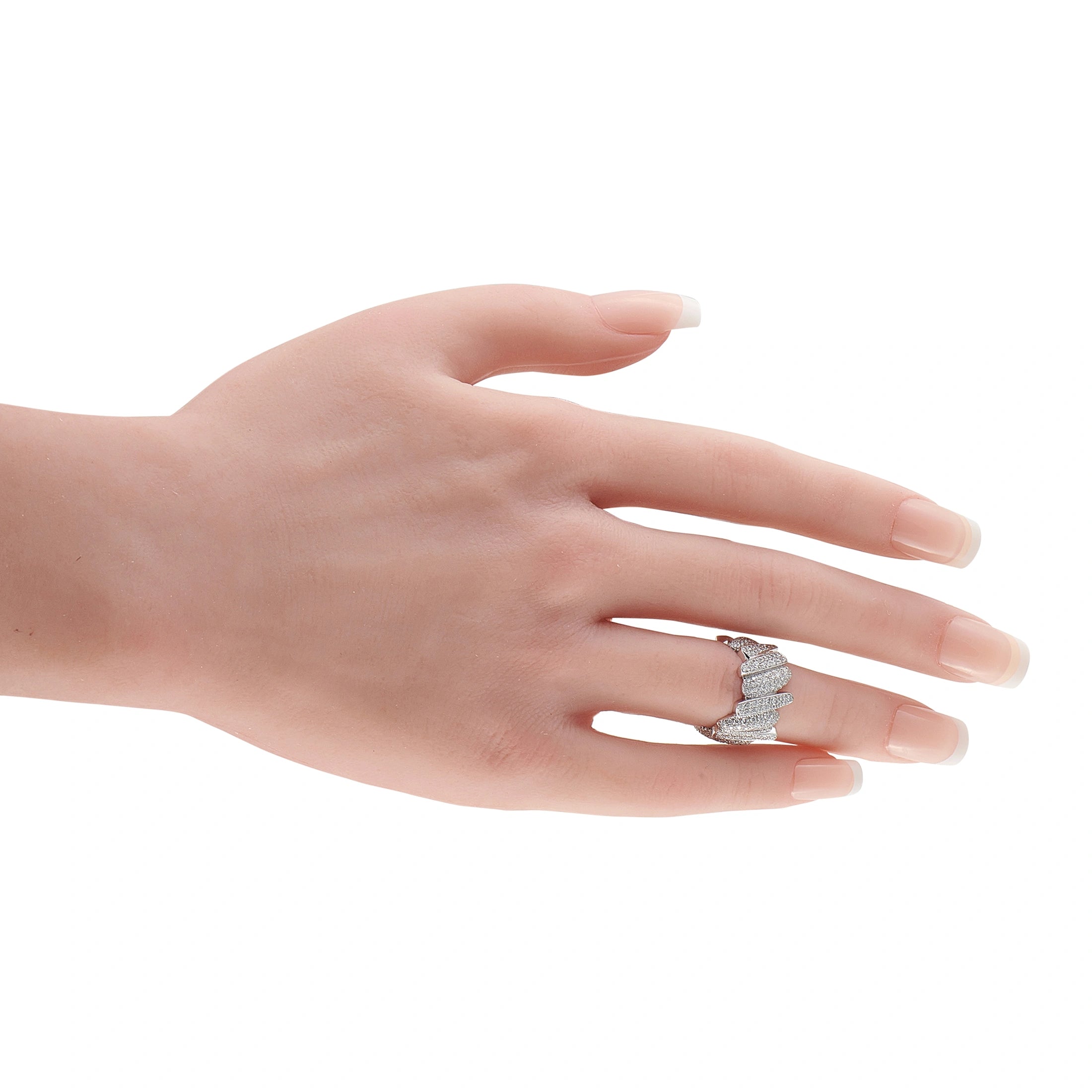 Fred OF Paris white gold diamond crossover ring on a hand