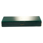 Green and gold-tone Gucci jewelry presentation case with hinged lid