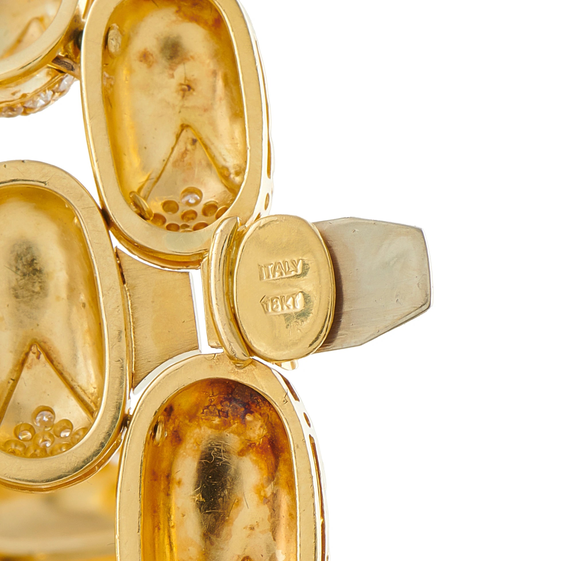 Gucci gold jewelry back with maker stamp and oval link details