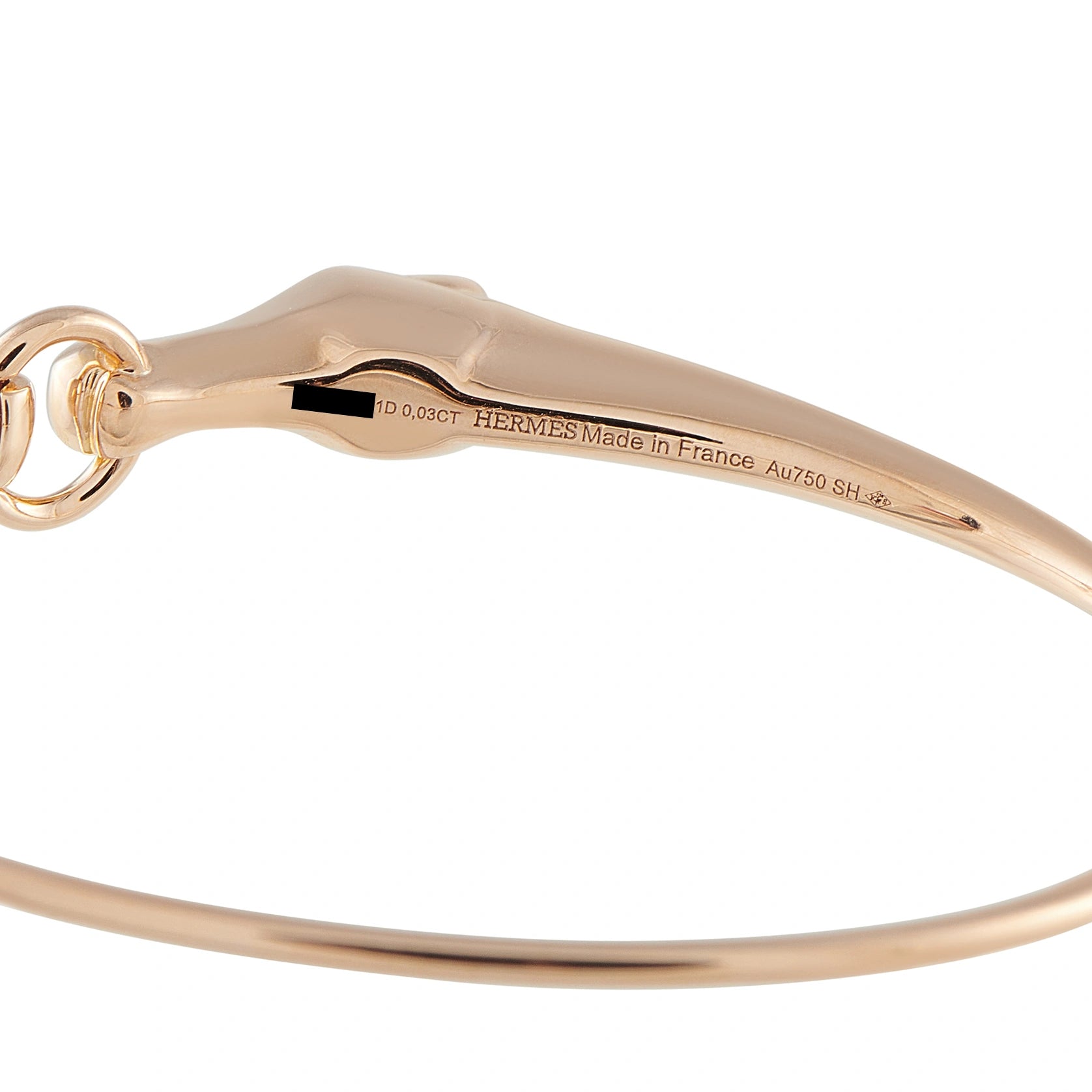 Rose gold bracelet underside with Hermes engraving and diamond clasp