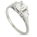 White gold diamond ring with large princess-cut center and baguette side stones