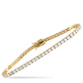 Yellow gold tennis bracelet with round lab-grown diamonds in a slim linked row