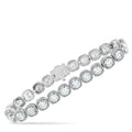 White gold diamond bracelet with alternating round bezel-set stones