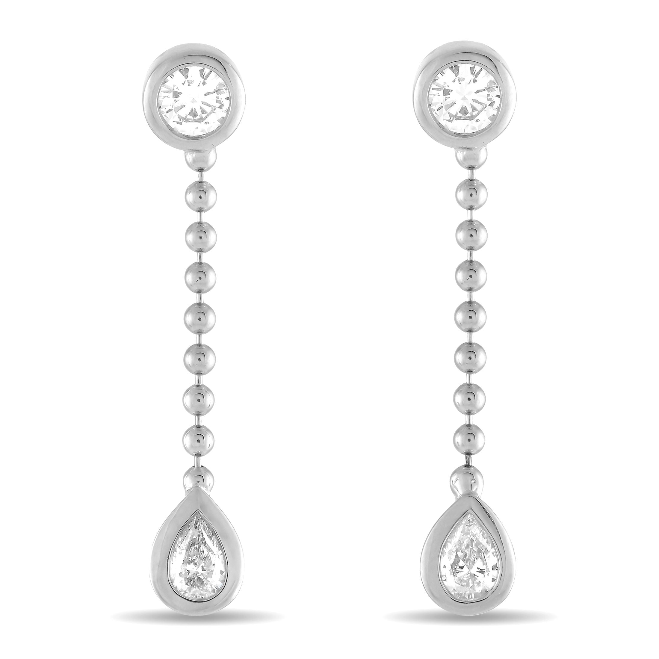 Exclusive 18K White Gold 1.06ct Diamond Dangle Earrings – These earrings will instantly add a touch of elegance to any occasi