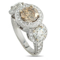 18K white gold diamond ring with two round stones and pavé halo setting