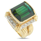 Exclusive 18K Yellow and White Gold 0.28ct Diamond and Tourmaline Ring - This Exclusive  ring showcases a 12.77-carat green tourmaline, bezel-set and elevated above a tiered frame of diamonds. The w