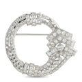 Platinum diamond brooch with circular design and geometric cluster detail