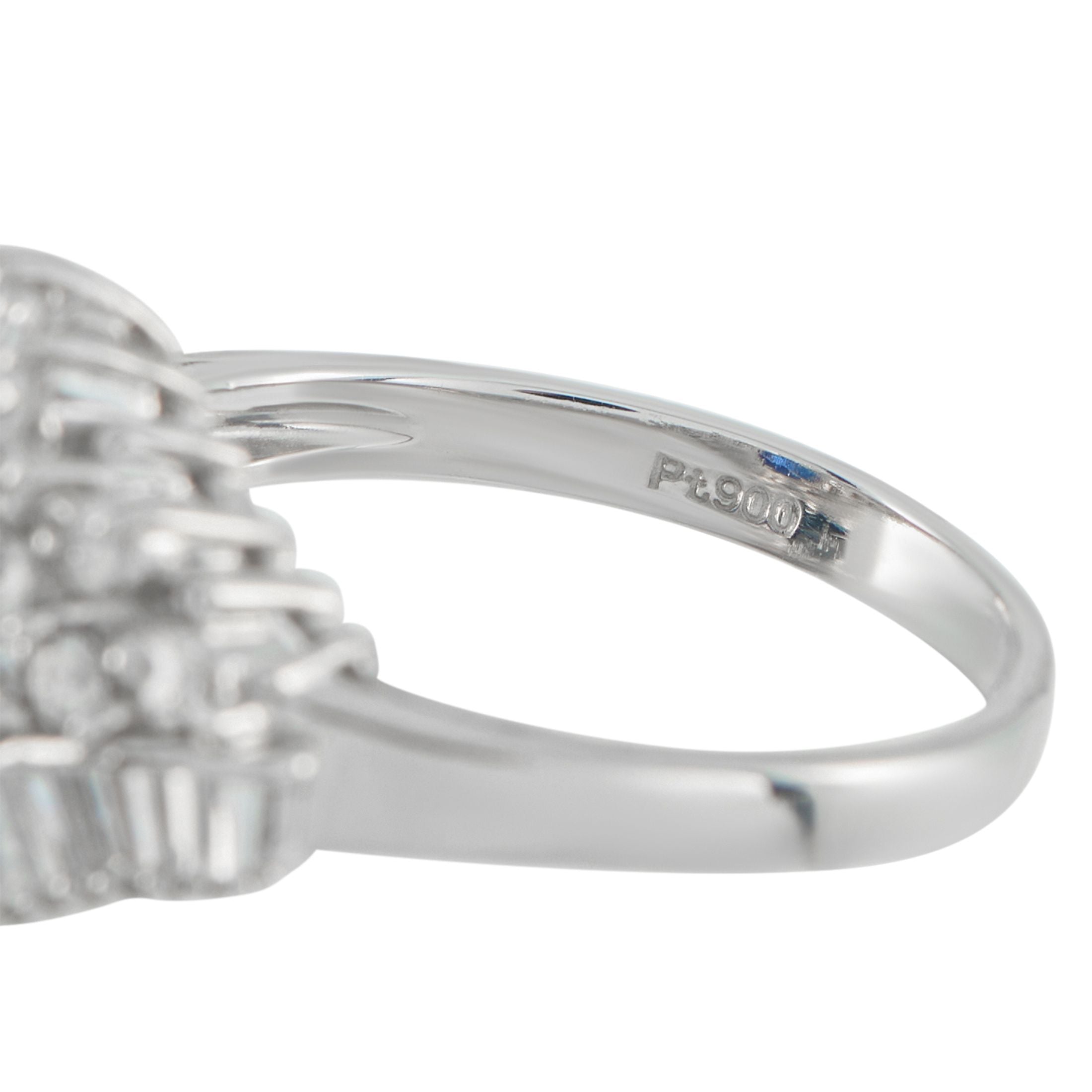 Exclusive Platinum 0.84ct Diamond and Sapphire Ring