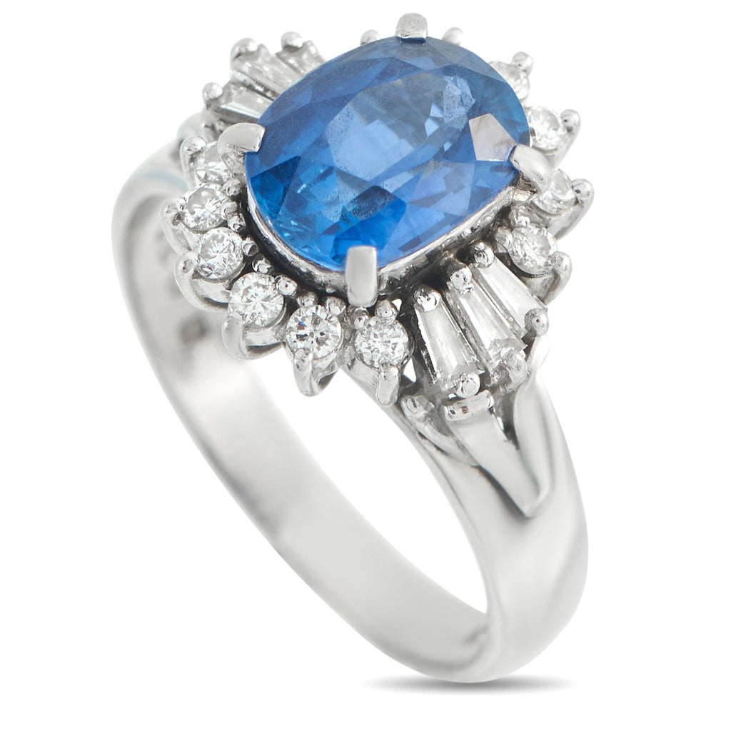 Exclusive Platinum 0.33ct Diamond and Sapphire Ring - Compact yet full of life, this Exclusive  ring displays a 1.83-carat oval sapphire on a platinum band. Tapered baguette diamo