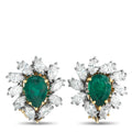 Emerald cluster stud earrings with diamond halo and yellow gold bezel setting