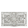 Platinum diamond brooch with geometric openwork and round stones