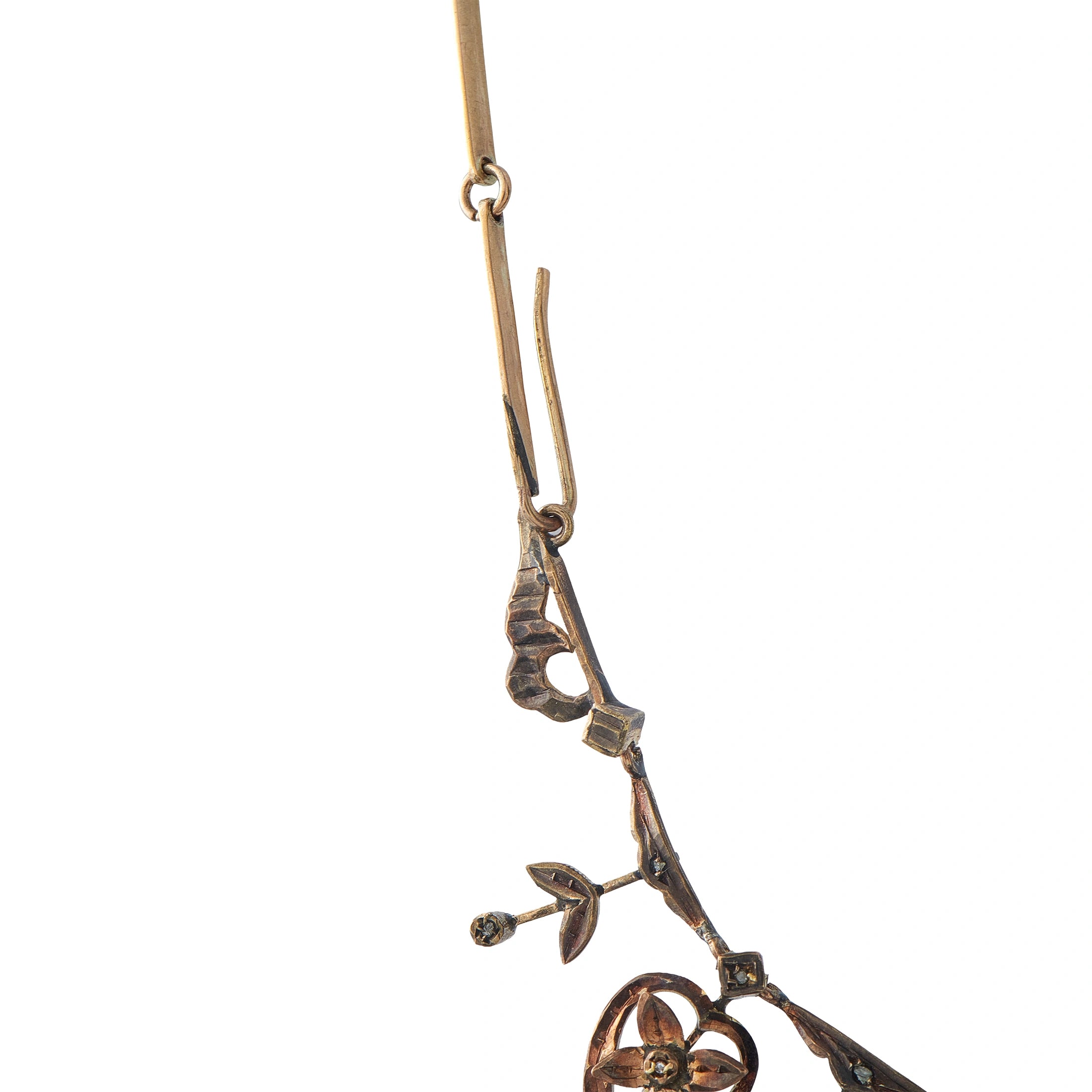 Rose gold diamond necklace close-up with adjustable loop and heart pendant